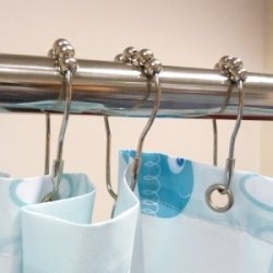 "Roller Ball" luksus Gardinringe i rustfrit stl. 12-stk sker.